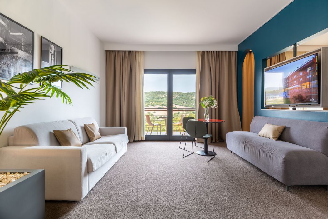 Custom-made hotel furnishings in an elegant modern style: living area