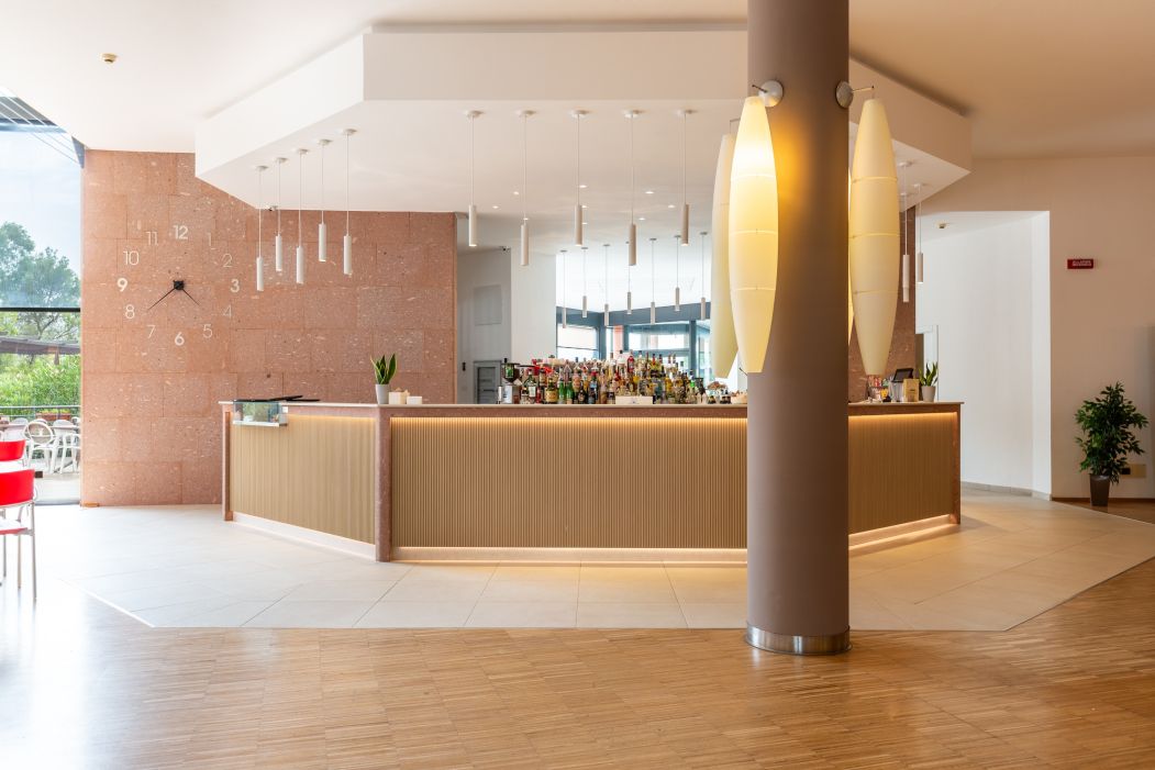 Custom-made hotel furnishings in an elegant modern style: bar counter