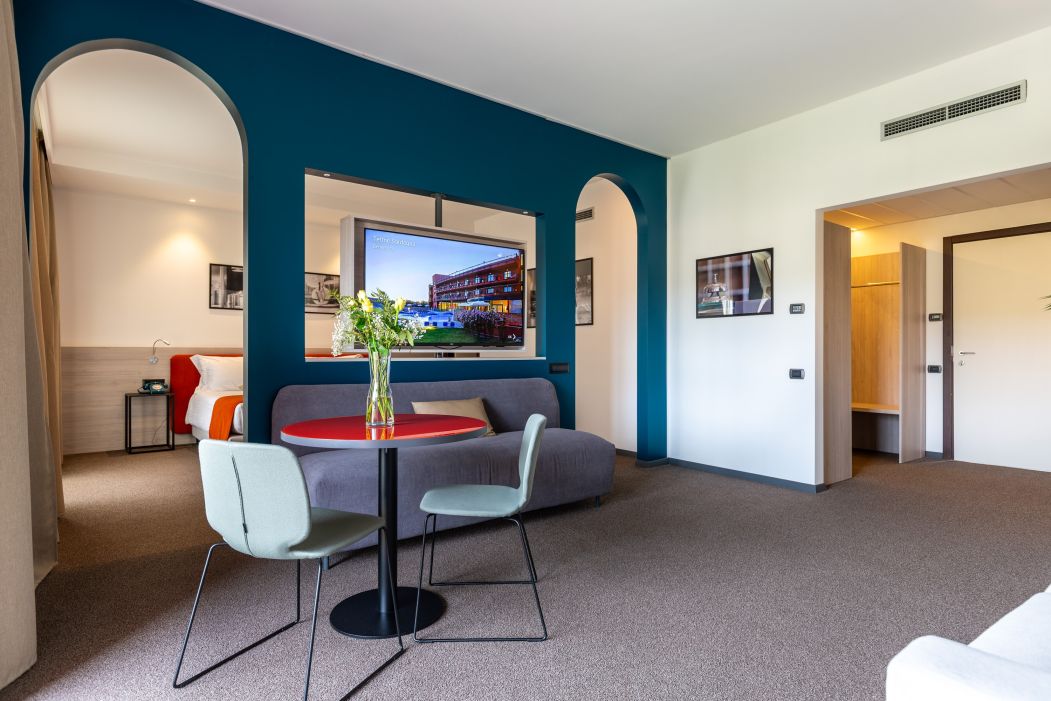 Custom-made hotel furnishings in an elegant modern style: living area
