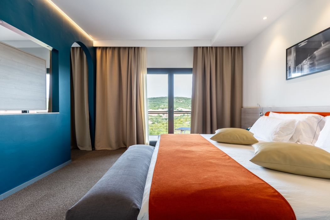Custom-made hotel furnishings in an elegant modern style: bedroom