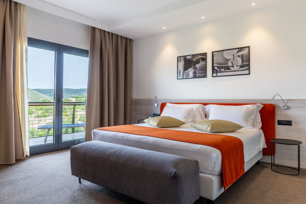 Custom-made hotel furnishings in an elegant modern style: bedroom