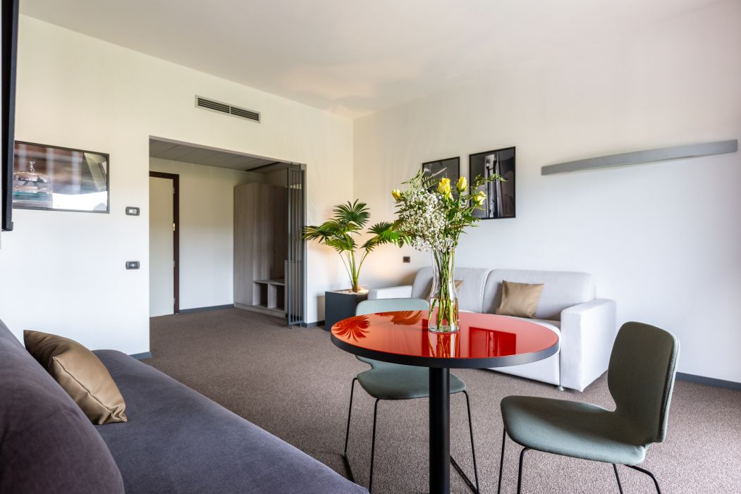 Custom-made hotel furnishings in an elegant modern style: living area