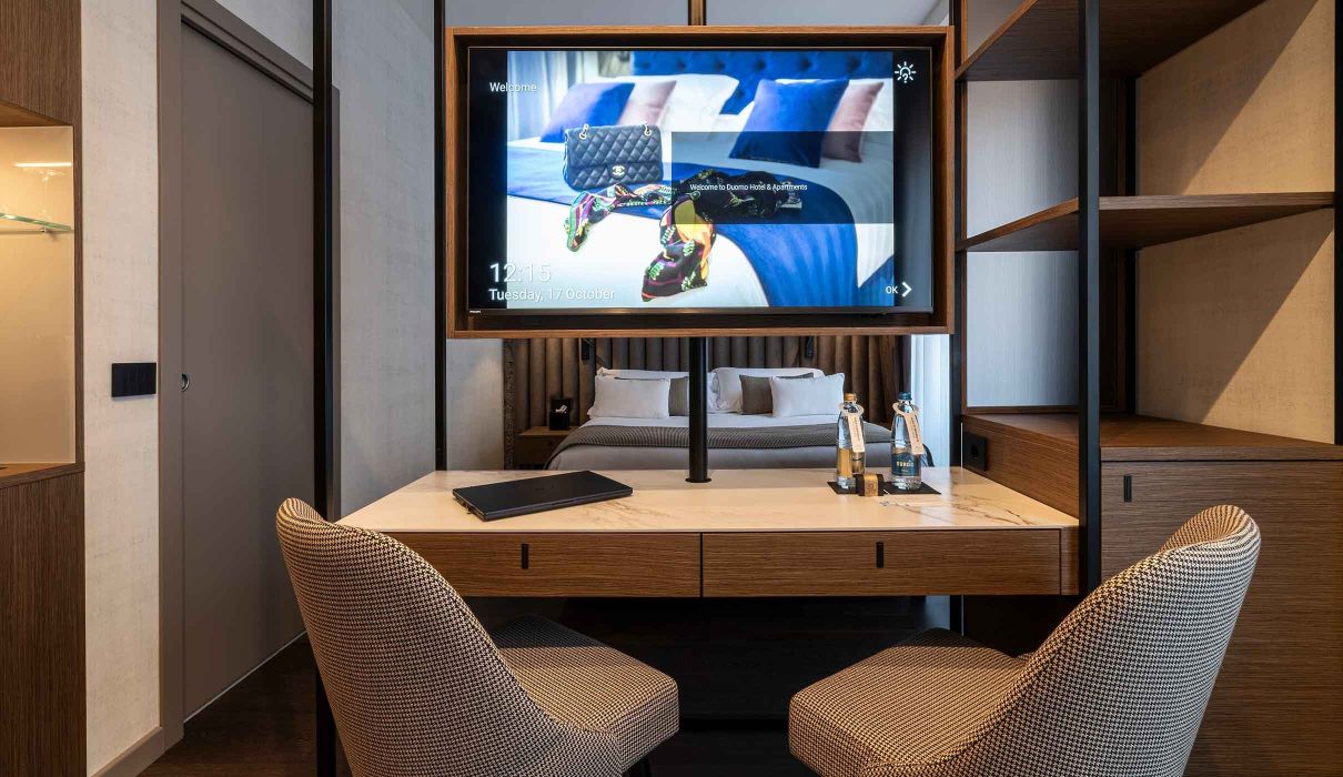 Hotel furniture: custom metal structure TV stand, desk and FRIGOBAR housing