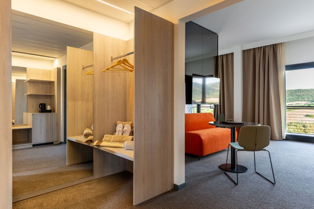 Custom-made hotel furnishings in an elegant modern style: bedroom