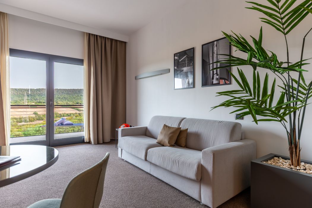 Custom-made hotel furnishings in an elegant modern style: bedroom