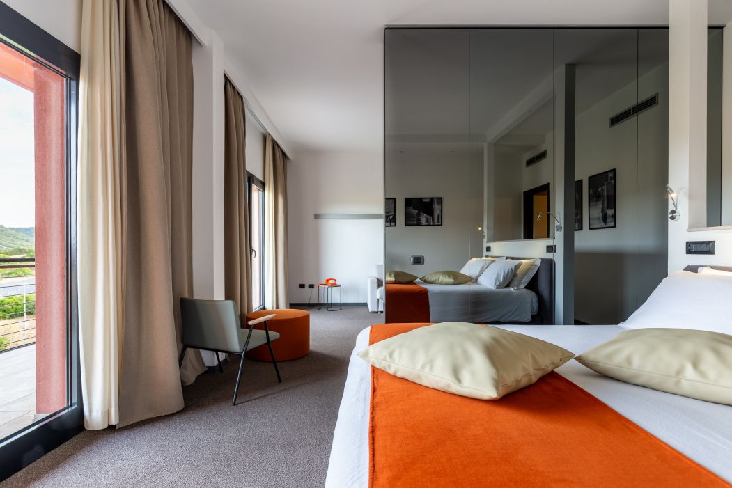 Custom-made hotel furnishings in an elegant modern style: bedroom