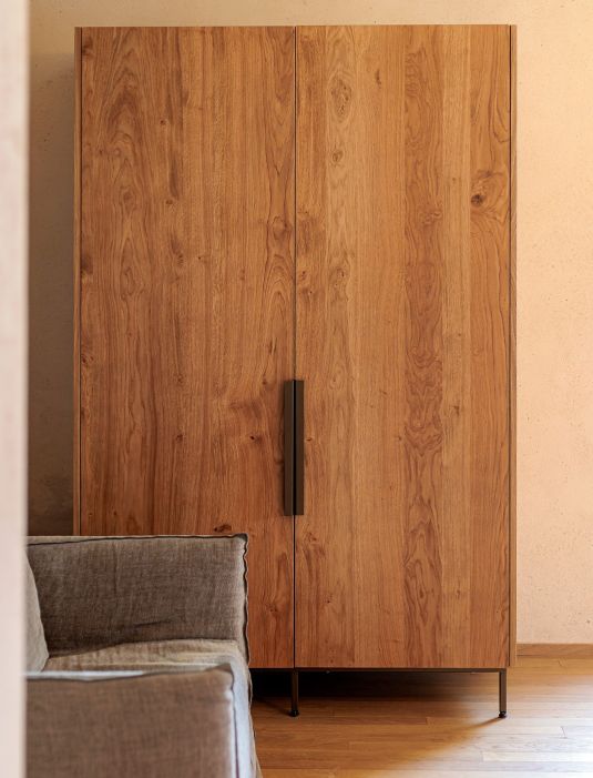 Custom-made hotel furniture: bedroom, wooden wardrobe detail