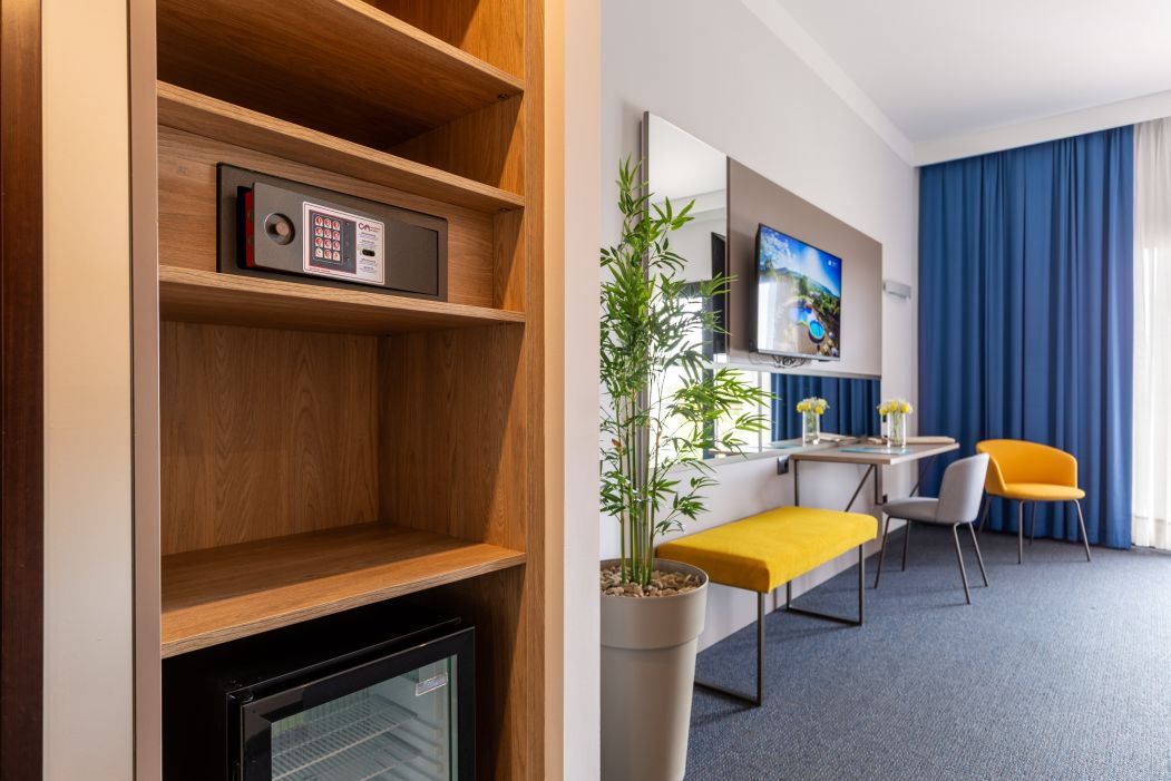 Custom-made hotel furnishings in an elegant modern style: bedroom