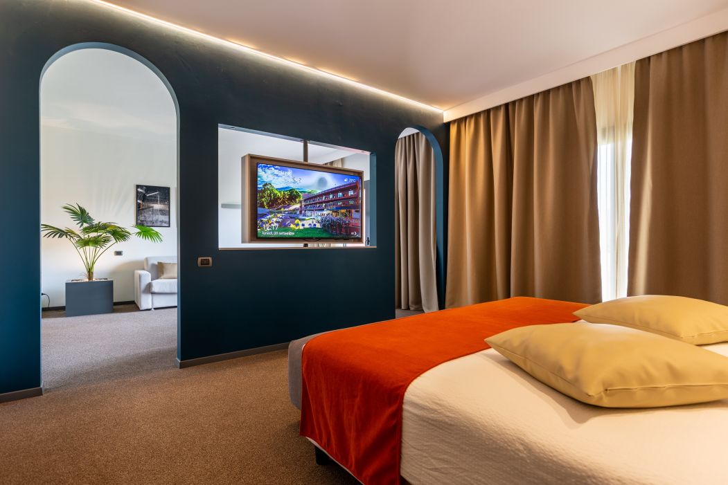 Custom-made hotel furnishings in an elegant modern style: bedroom