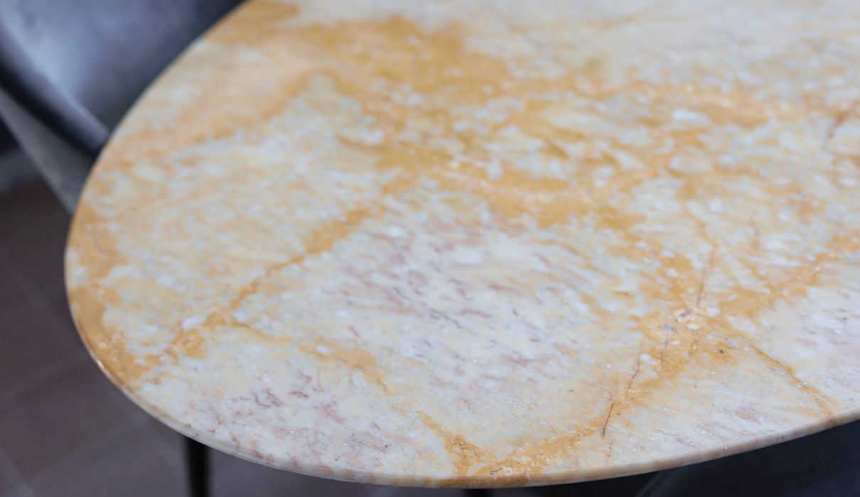 Custom-made hotel furniture: detail of a marble table